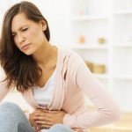 After ovulation, the stomach feels like before menstruation